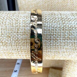 Kate Spade Gold-Tone Engraved Bangle Bracelet "Loose Yourself"